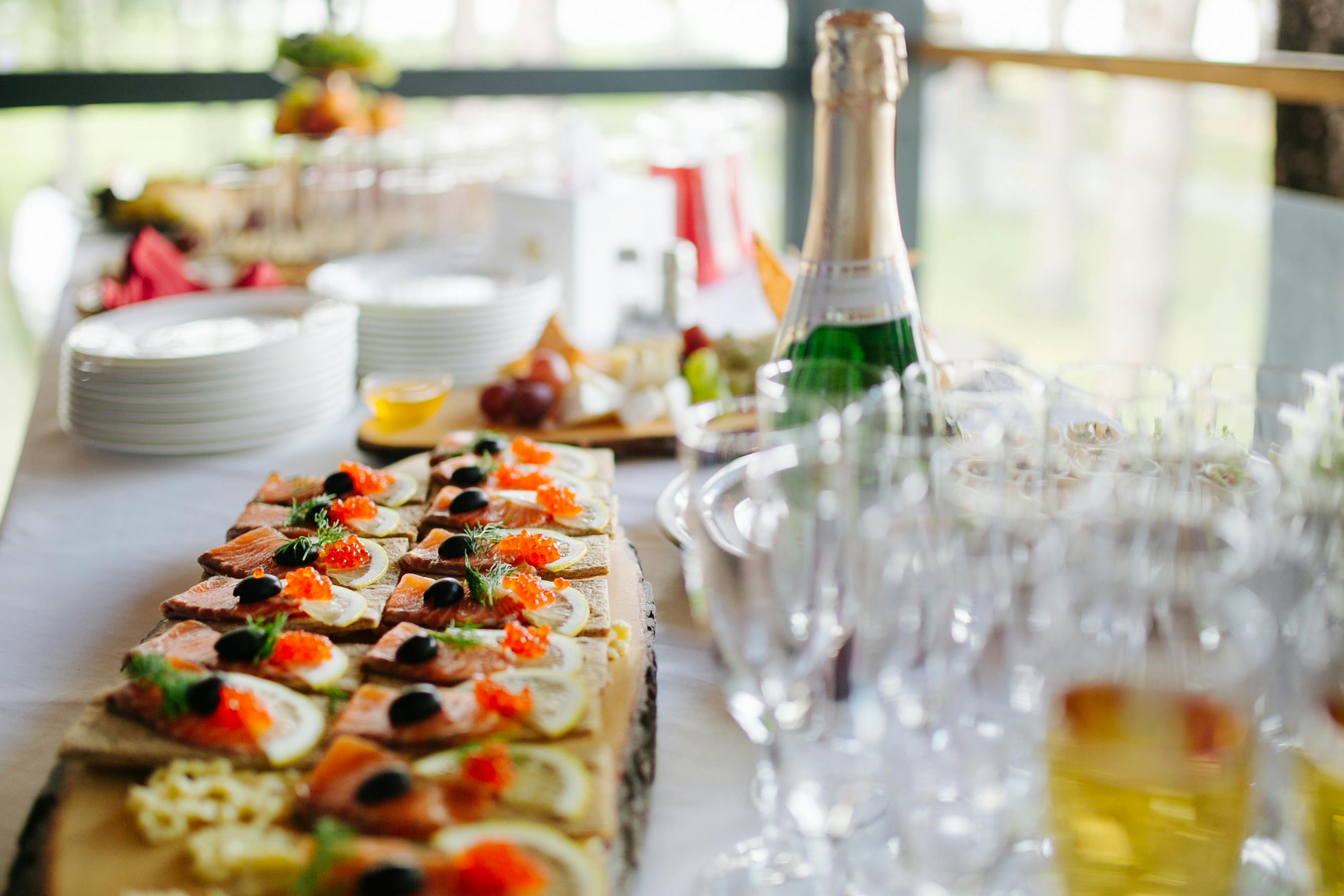 Table with drinks and finger food for corporate event