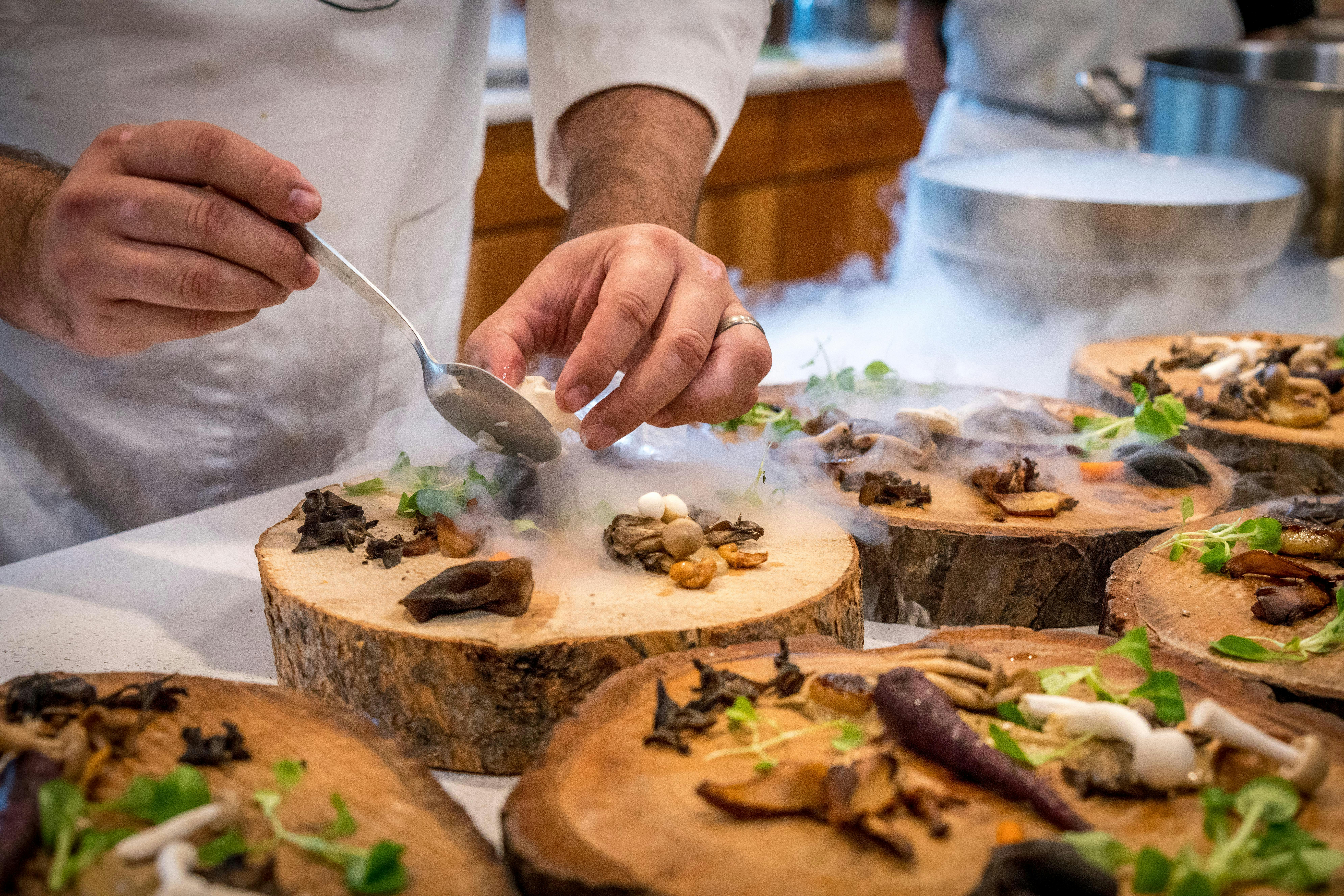 Food being prepared by chef for a social gathering